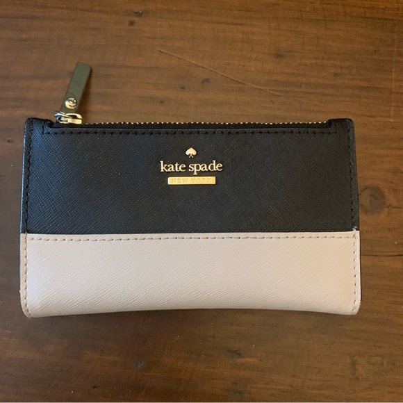 kate spade Handbags - KATE Spade Spencer Small Slim Bifold Leather Wallet Black & Beige.